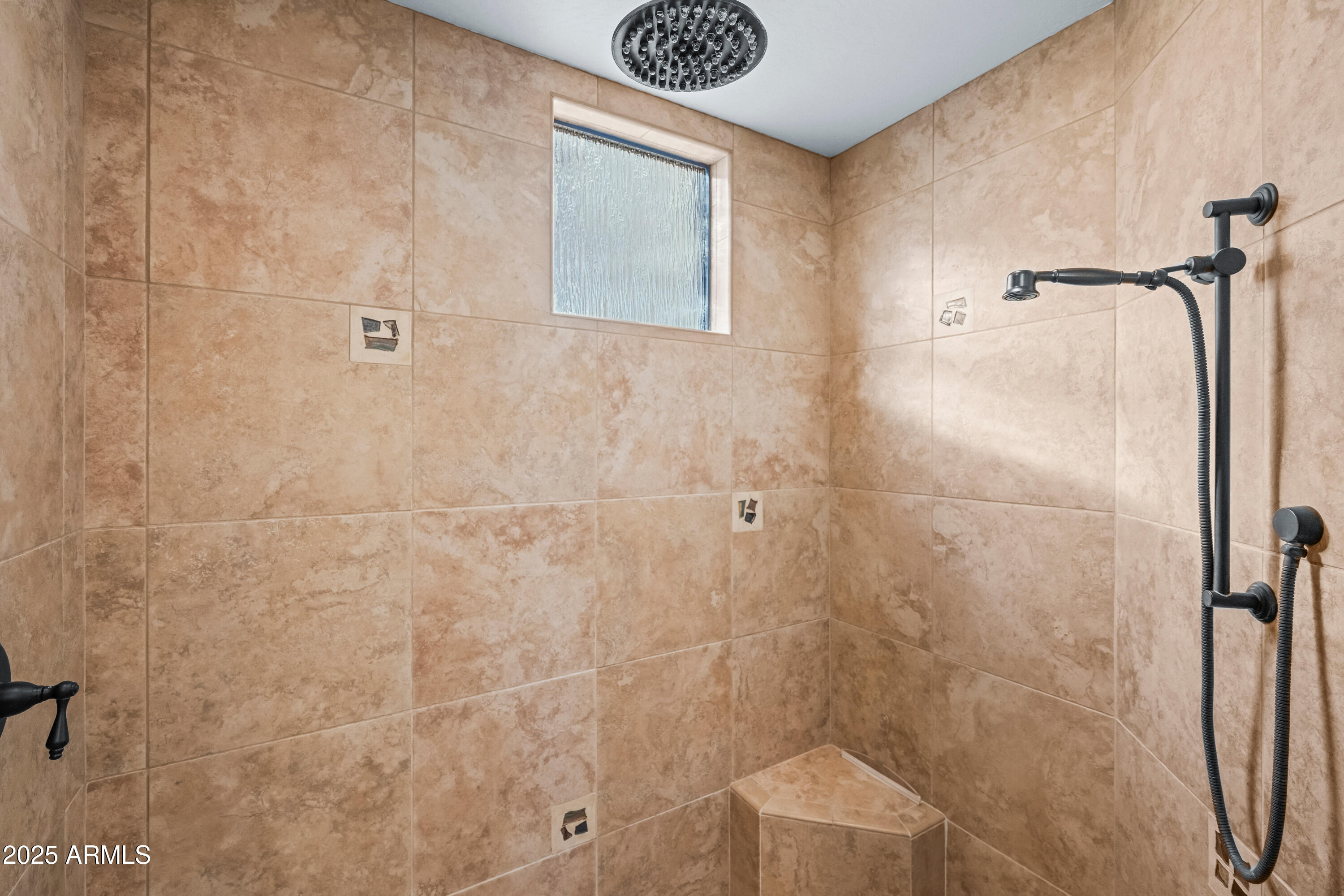 26708 North Aguila Road Rio Verde, AZ 85263 - Photo 25 of 46 a bathroom with a shower and a sink
