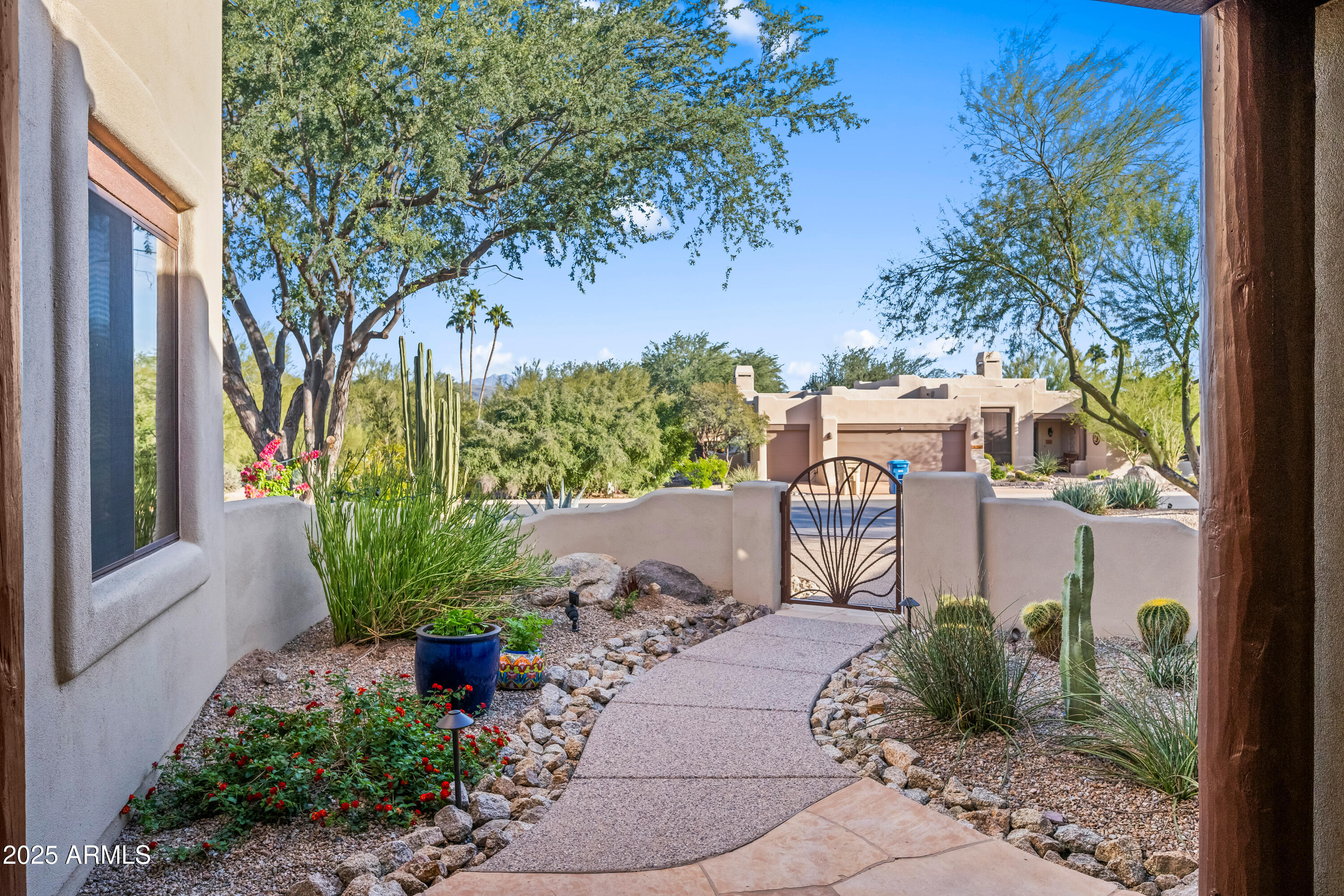 26708 North Aguila Road Rio Verde, AZ 85263 - Photo 3 of 46 a garden view with a seating space