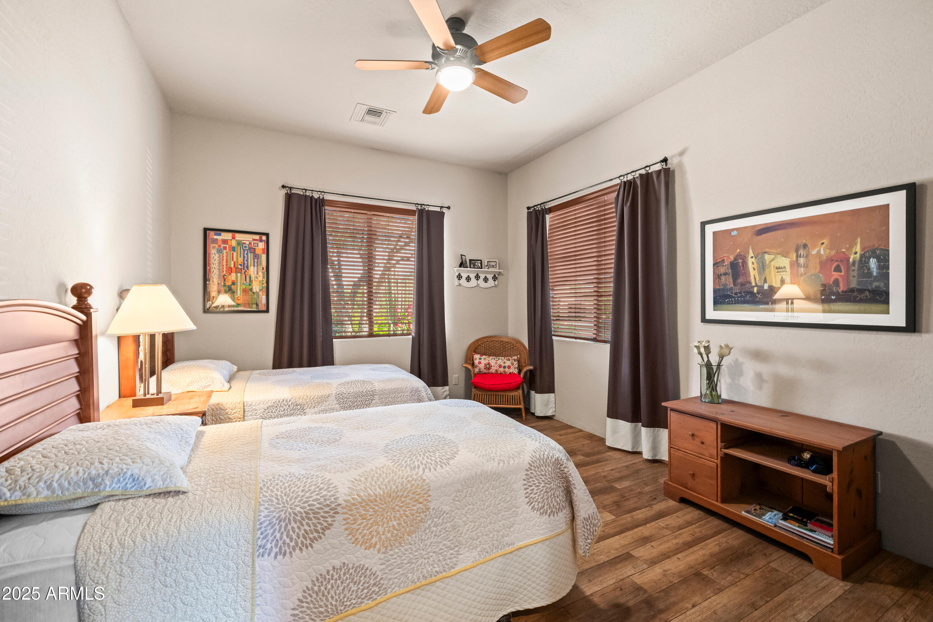 26708 North Aguila Road Rio Verde, AZ 85263 - Photo 32 of 46 a bedroom with a bed large window with wooden floor