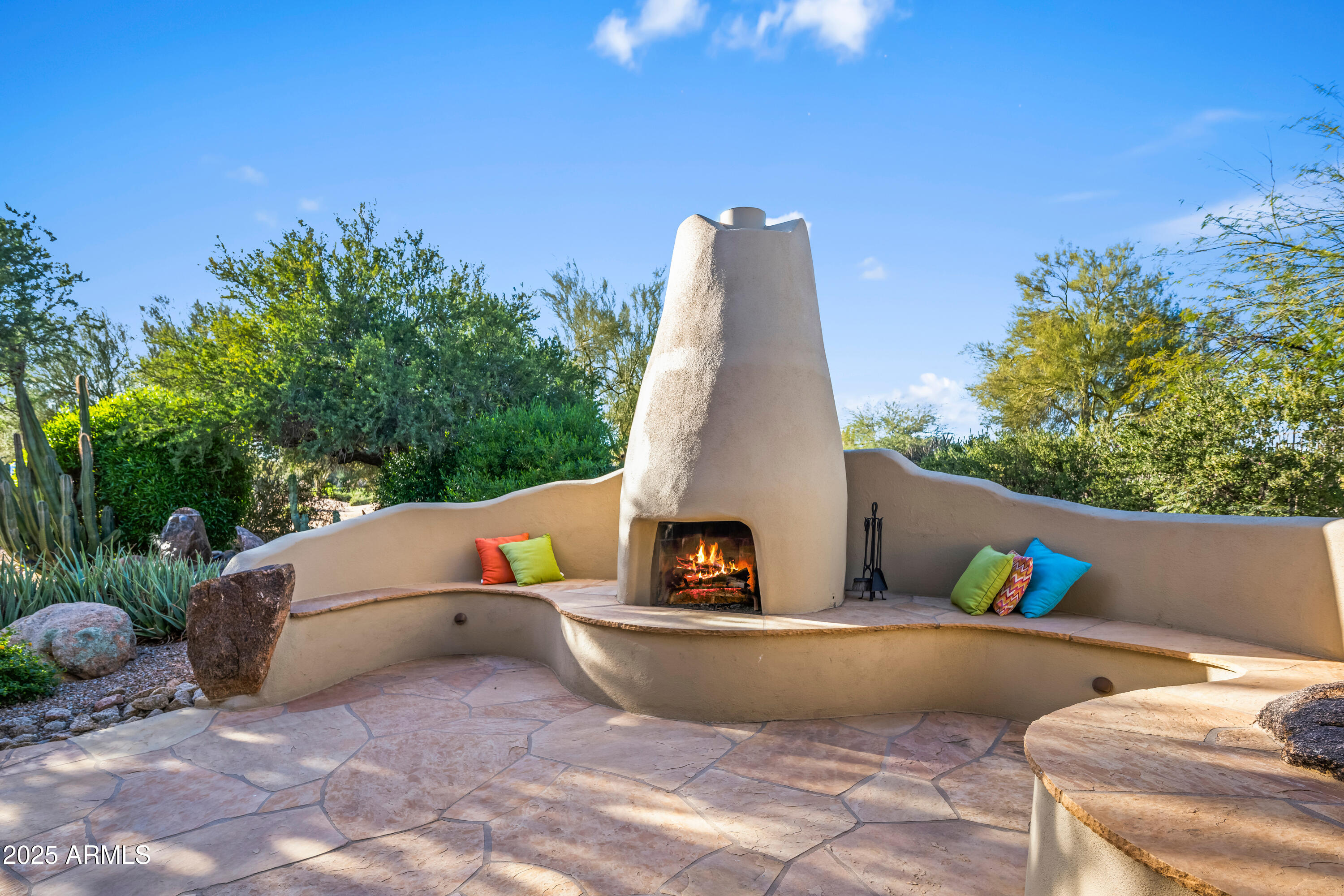 26708 North Aguila Road Rio Verde, AZ 85263 - Photo 39 of 46 a view of outdoor sitting area with couch and iron fence