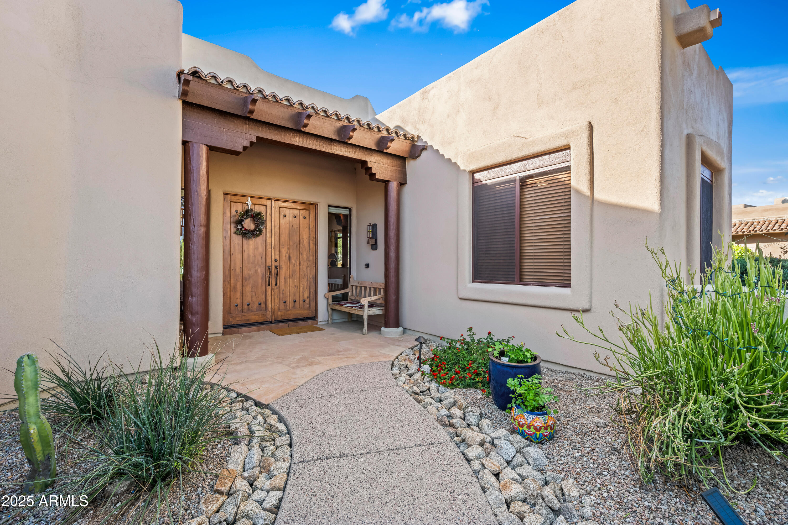 26708 North Aguila Road Rio Verde, AZ 85263 - Photo 4 of 46 a front view of a house