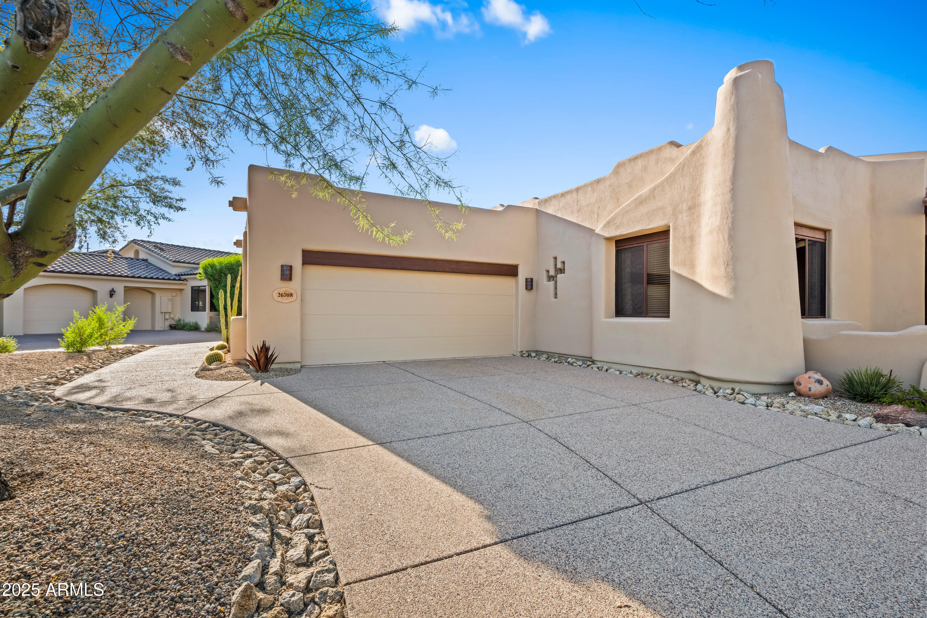 26708 North Aguila Road Rio Verde, AZ 85263 - Photo 45 of 46 a view of a house with a snow on the road