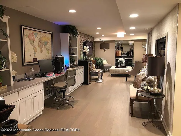 a view of a workspace with furniture