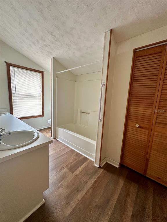 520 Southwest 5th Avenue Lake Butler, FL 32054 - Photo 8 of 54 an empty room with wooden floor and windows