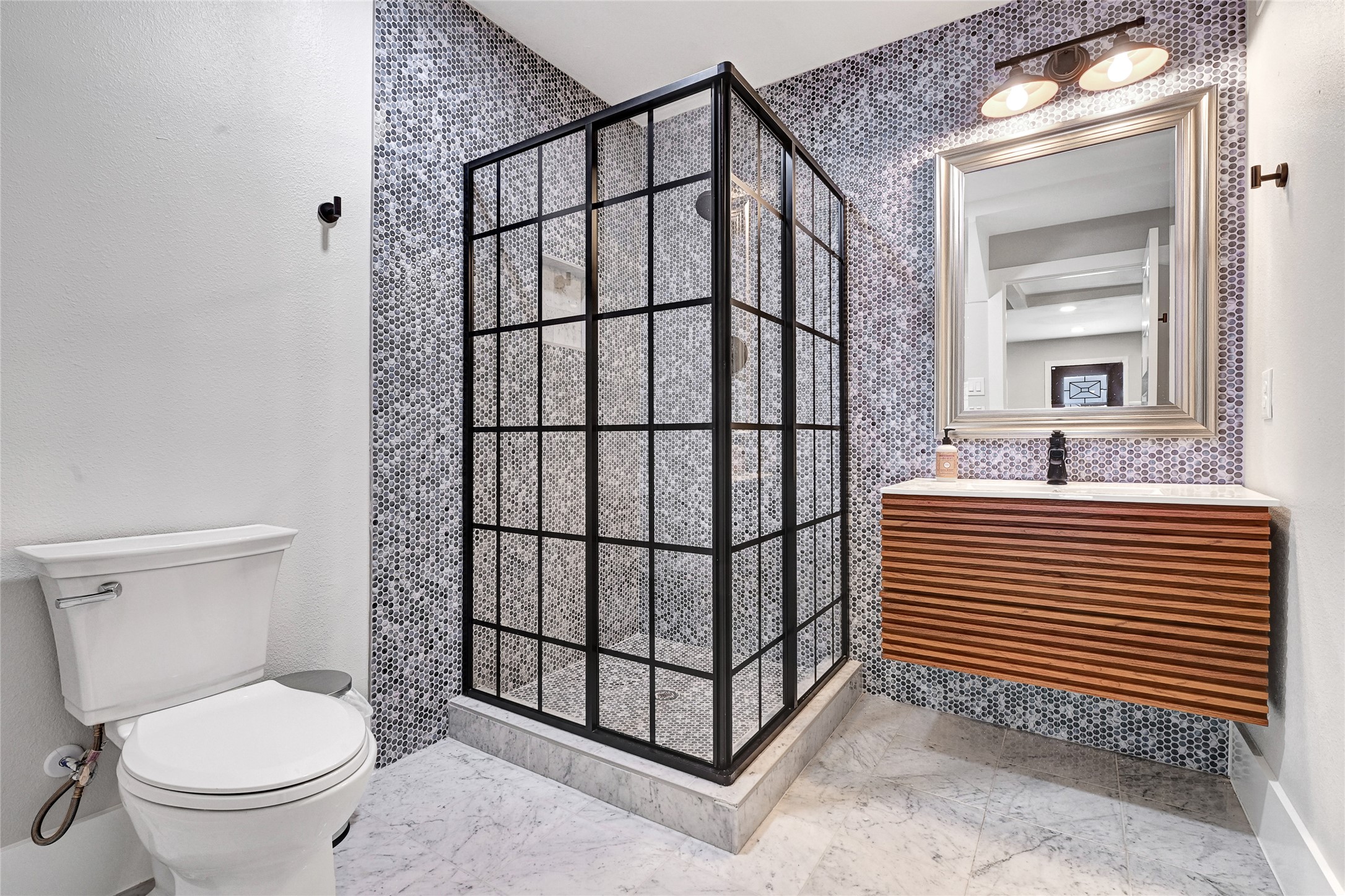 3343 Tampa Street Houston, TX 77021 - Photo 23 of 41 a bathroom with a sink a toilet and shower