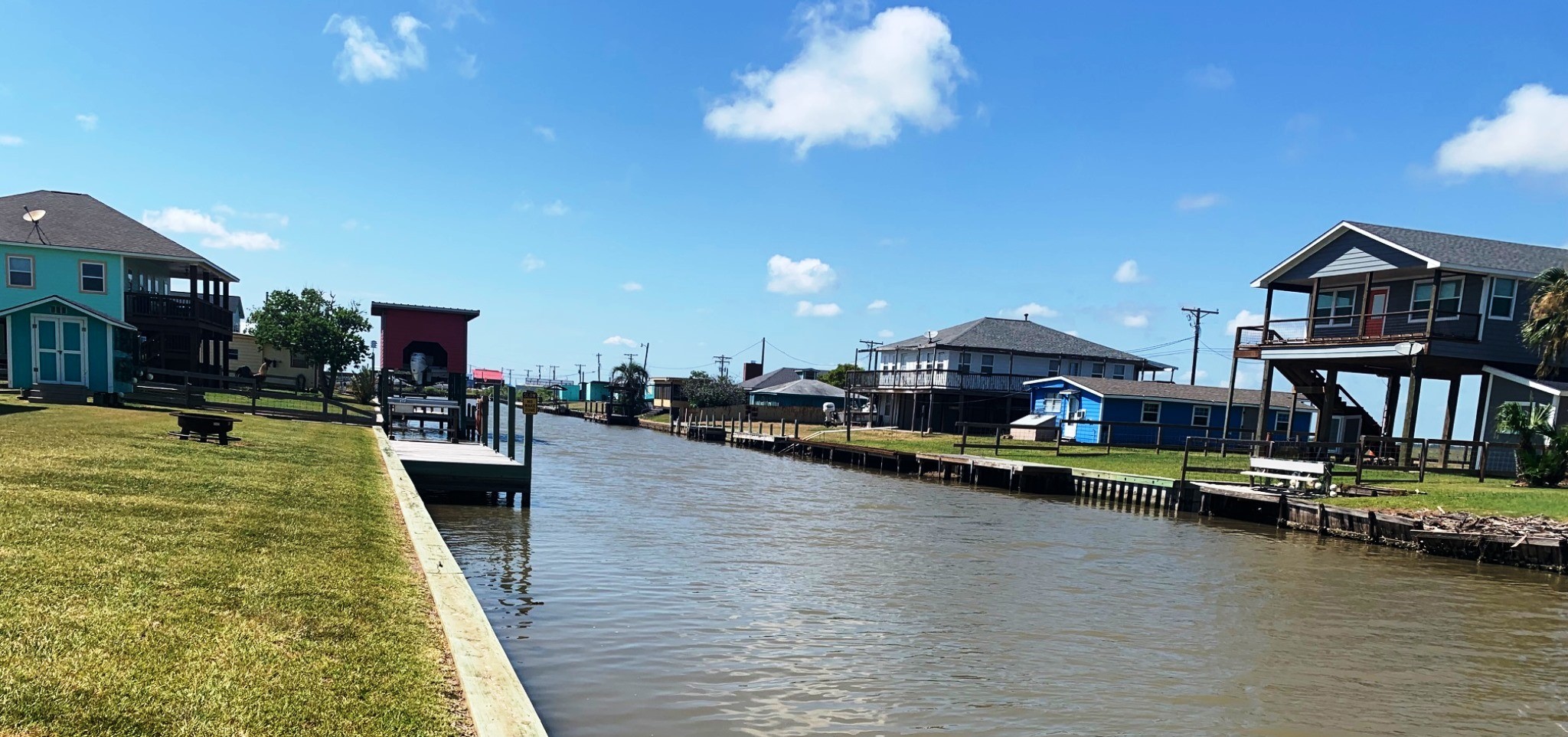 2331 Gulfview Drive Sargent, TX 77414 - Photo 4 of 5 a view of a swimming pool and lounge chair