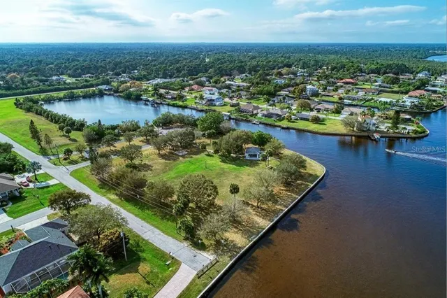 a view of a lake with a city