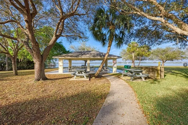 a view of a yard with swimming pool