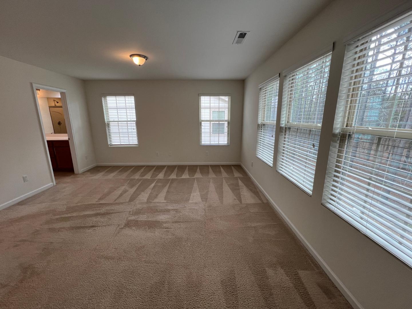 219 Cross Blossom Road Durham, NC 27703 - Photo 19 of 35 a view of livingroom with window