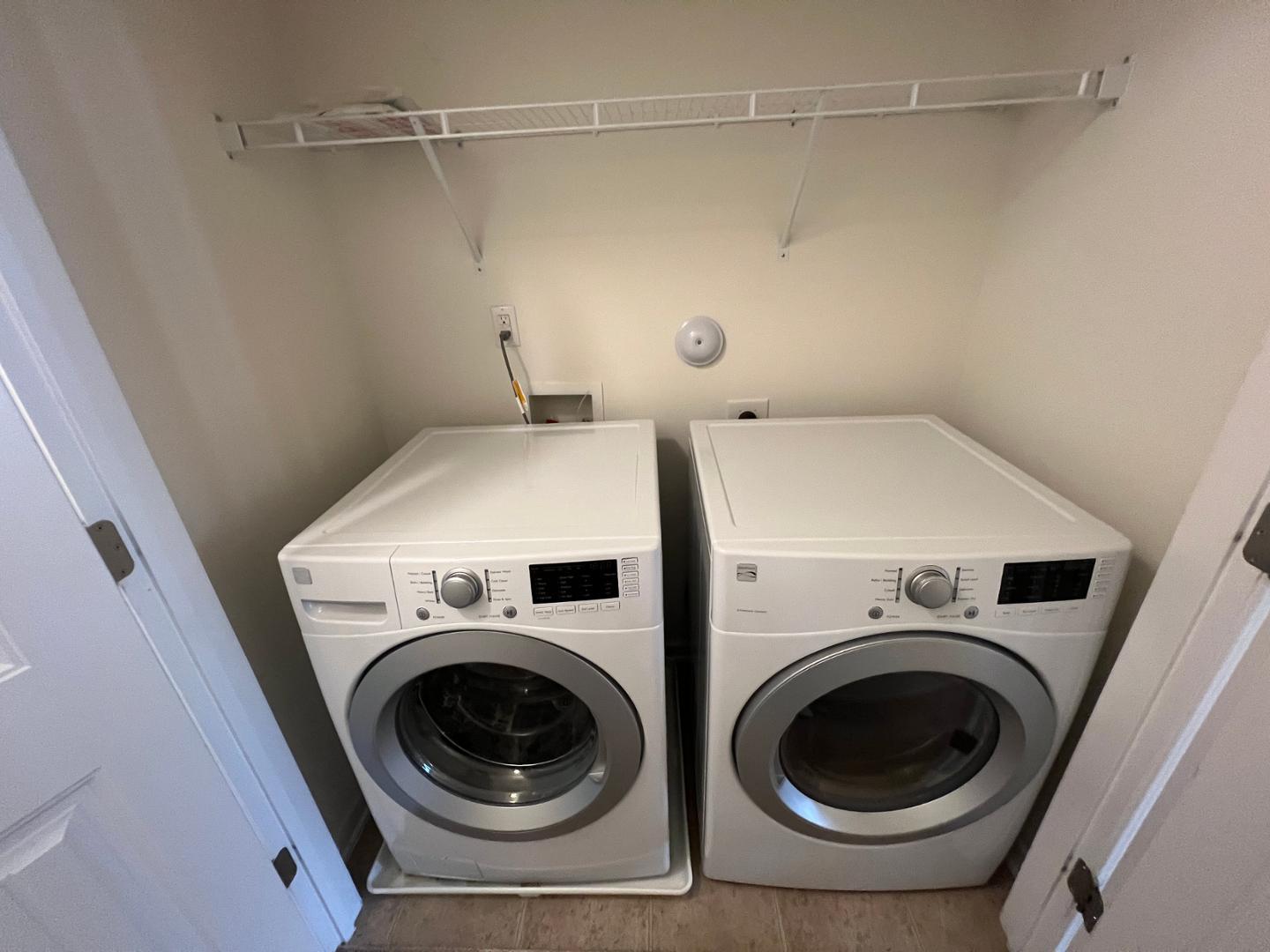219 Cross Blossom Road Durham, NC 27703 - Photo 28 of 35 a utility room with dryer and washer