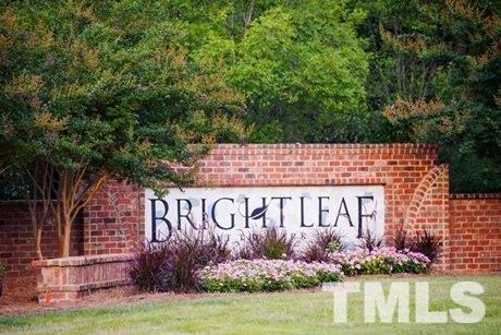 219 Cross Blossom Road Durham, NC 27703 - Photo 34 of 35 a sign on the side of a building
