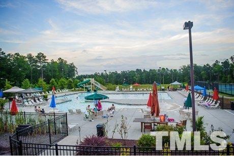 219 Cross Blossom Road Durham, NC 27703 - Photo 35 of 35 a view of a terrace with sitting area
