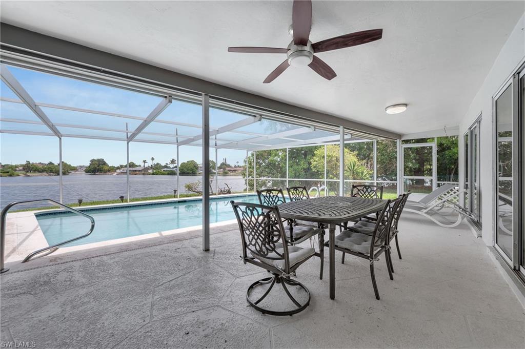3065 50th Lane Southwest Naples, FL 34116 - Photo 22 of 31 a view of a dining room with furniture window and outside view