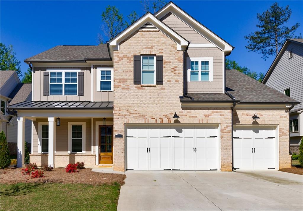1130 Sweet Mia Lane Powder Springs, GA 30127 - Photo 1 of 1 front view of a house with a yard