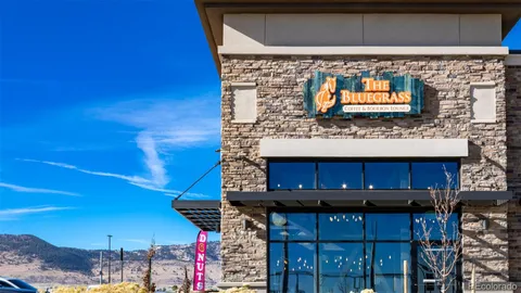 a view of a livingroom with furniture and gym equipment