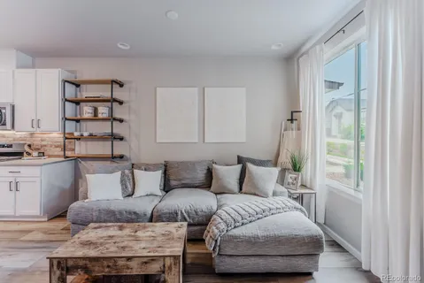 a bedroom with furniture and a couch