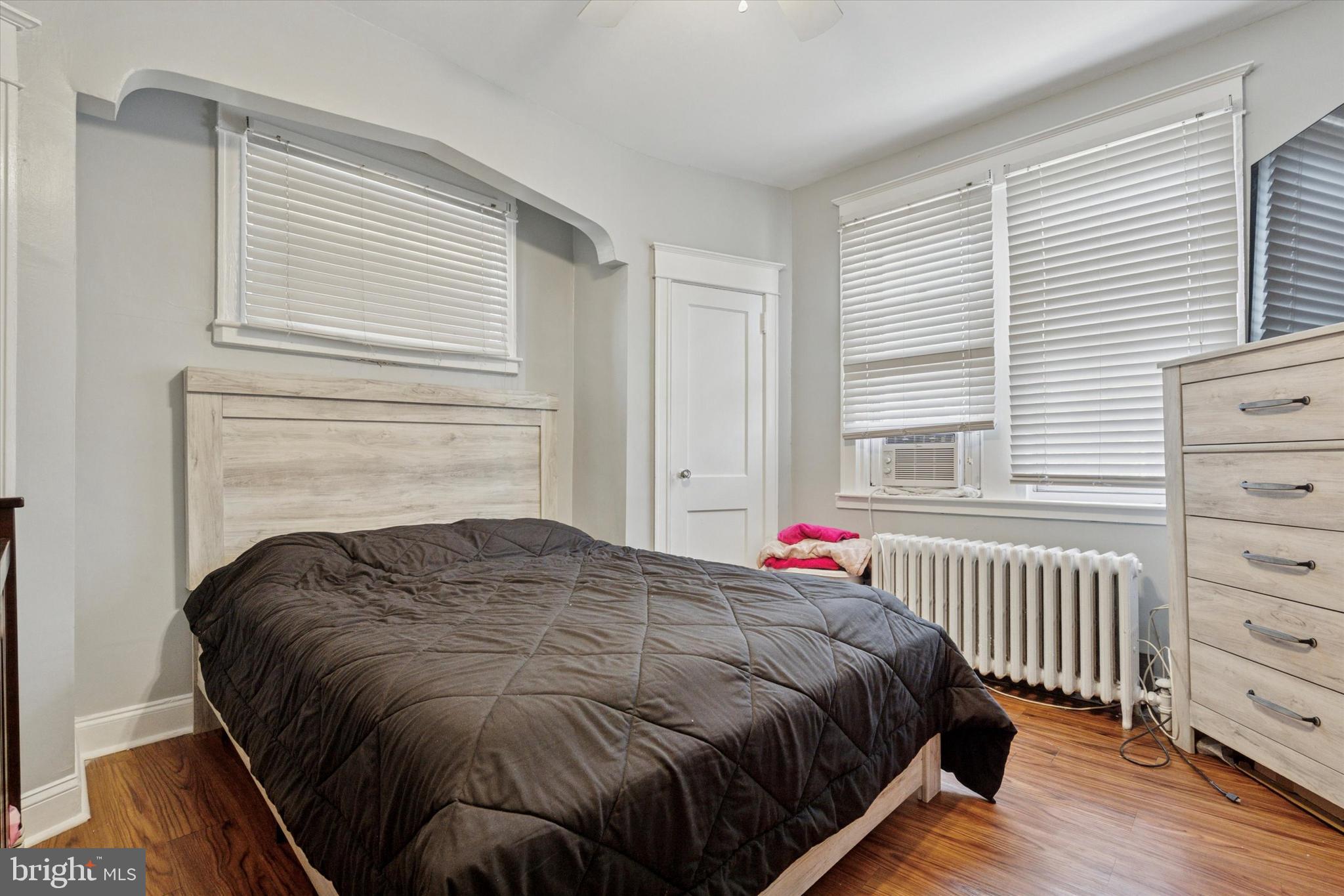 3252 Cottman Avenue Philadelphia, PA 19149 - Photo 11 of 15 a bed sitting in a bedroom next to a window