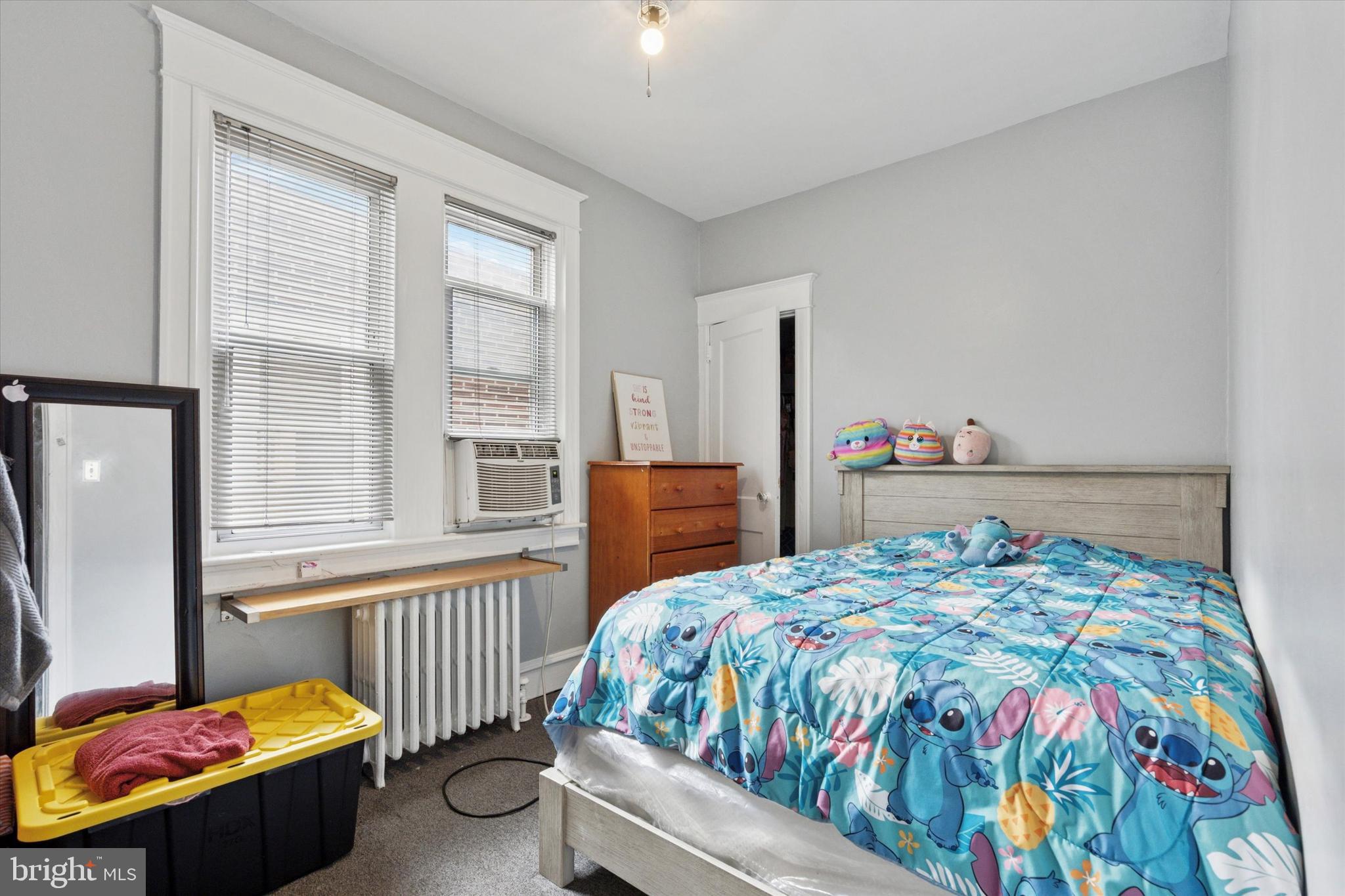 3252 Cottman Avenue Philadelphia, PA 19149 - Photo 14 of 15 a bedroom with a bed and a window
