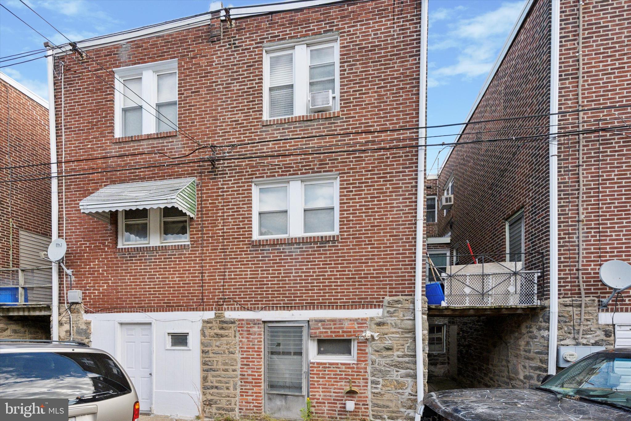 3252 Cottman Avenue Philadelphia, PA 19149 - Photo 15 of 15 a front view of a house with a yard