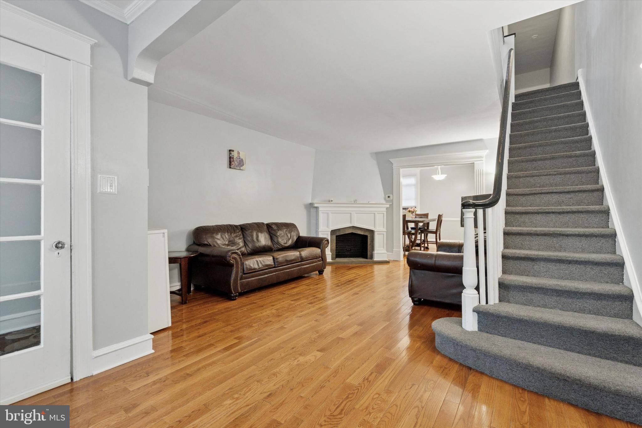3252 Cottman Avenue Philadelphia, PA 19149 - Photo 2 of 15 a living room with furniture and wooden floor
