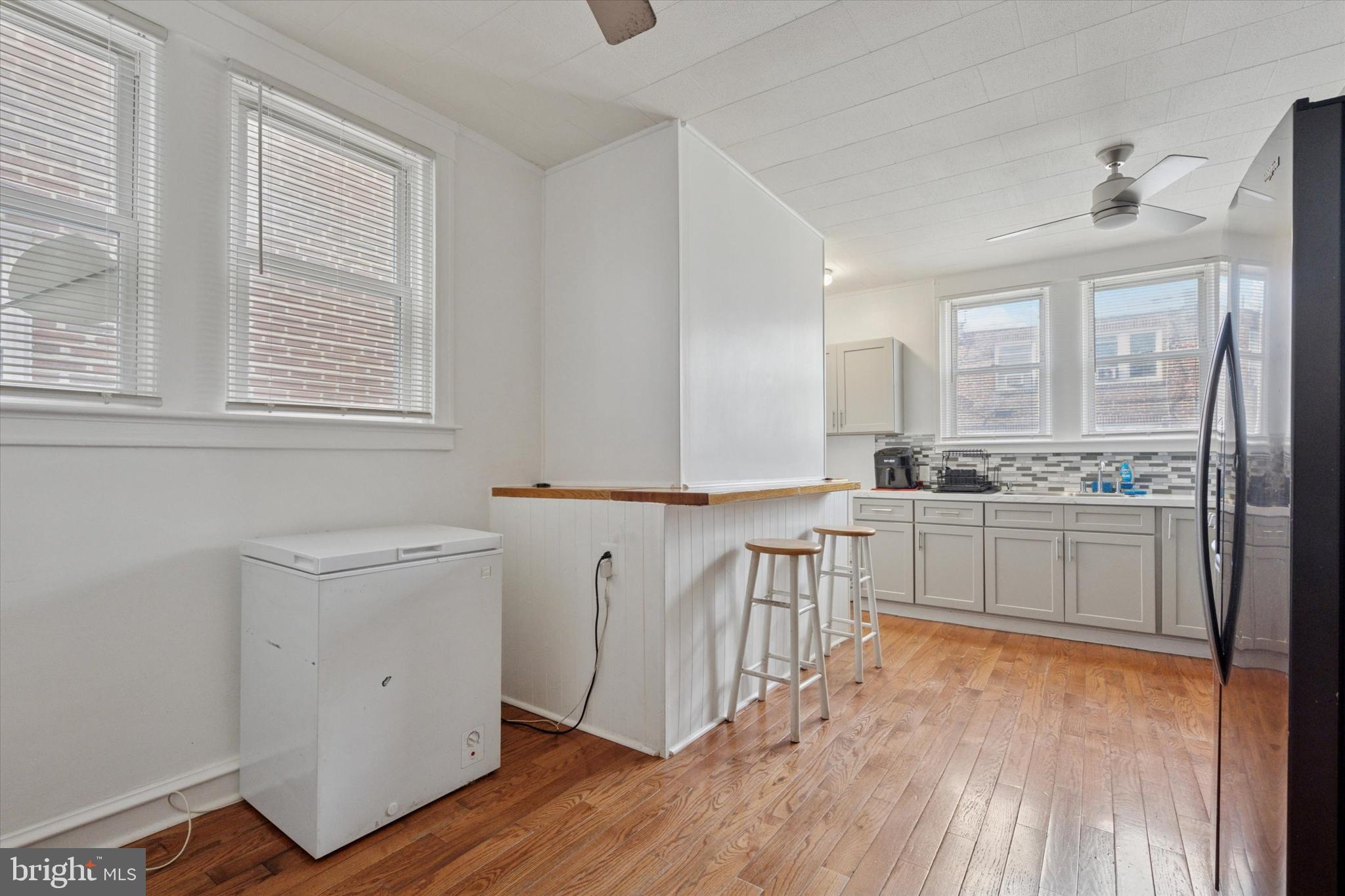 3252 Cottman Avenue Philadelphia, PA 19149 - Photo 8 of 15 a view of a kitchen with wooden floor and electronic appliances