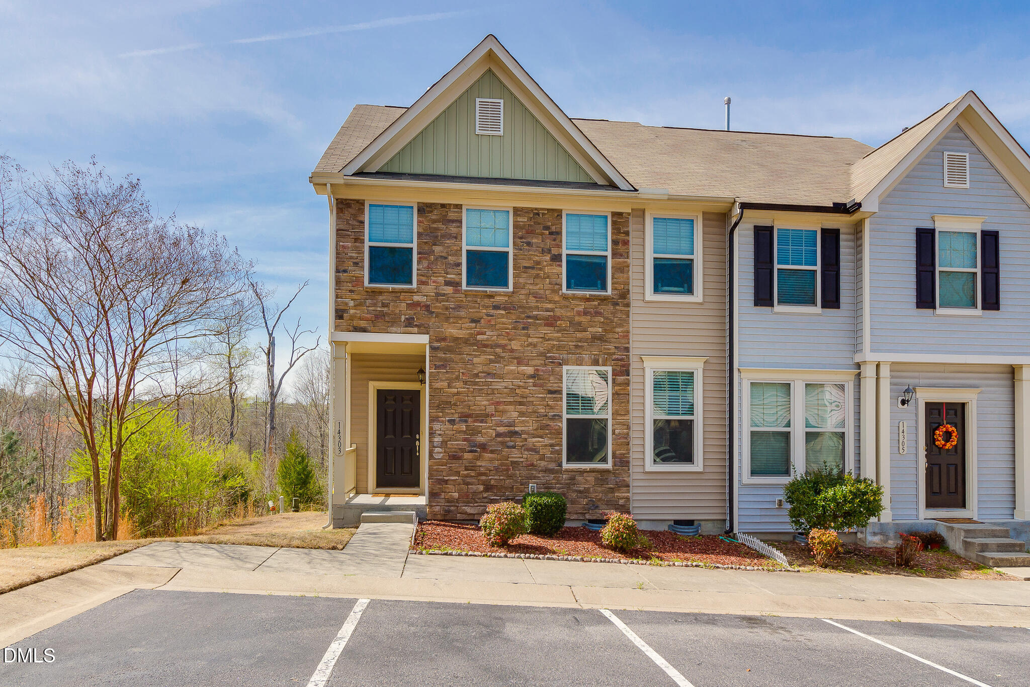 14303 Foxcroft Road Raleigh, NC 27614 - Photo 2 of 70 a view of a brick house with many windows