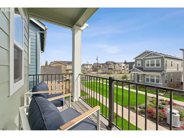 a view of balcony with furniture