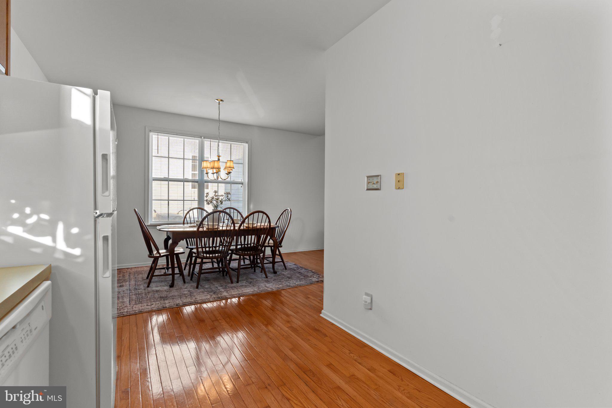237 Beaumont Drive Oxford, PA 19363 - Photo 14 of 46 a view of a dining room with furniture and a window