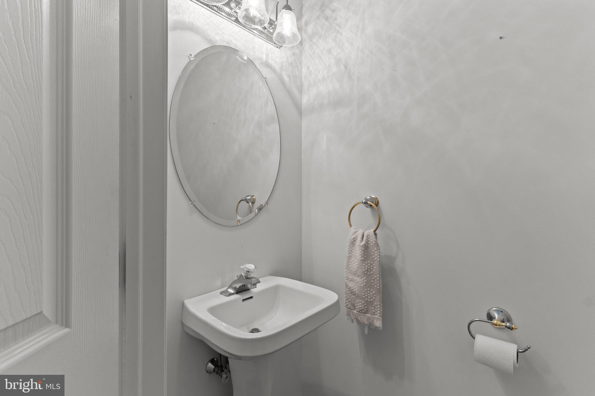 237 Beaumont Drive Oxford, PA 19363 - Photo 15 of 46 a bathroom with a sink and mirror