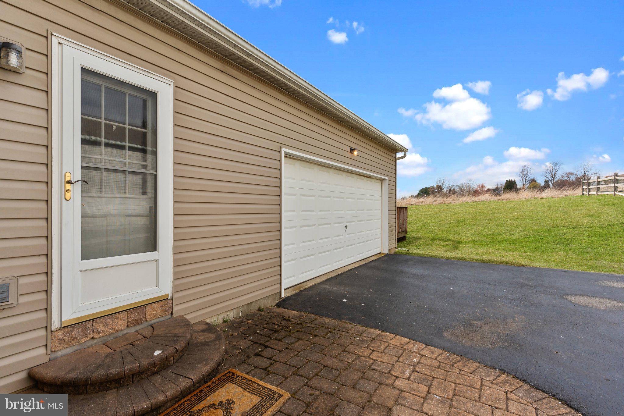 237 Beaumont Drive Oxford, PA 19363 - Photo 34 of 46 a view of a backyard with an outdoor space