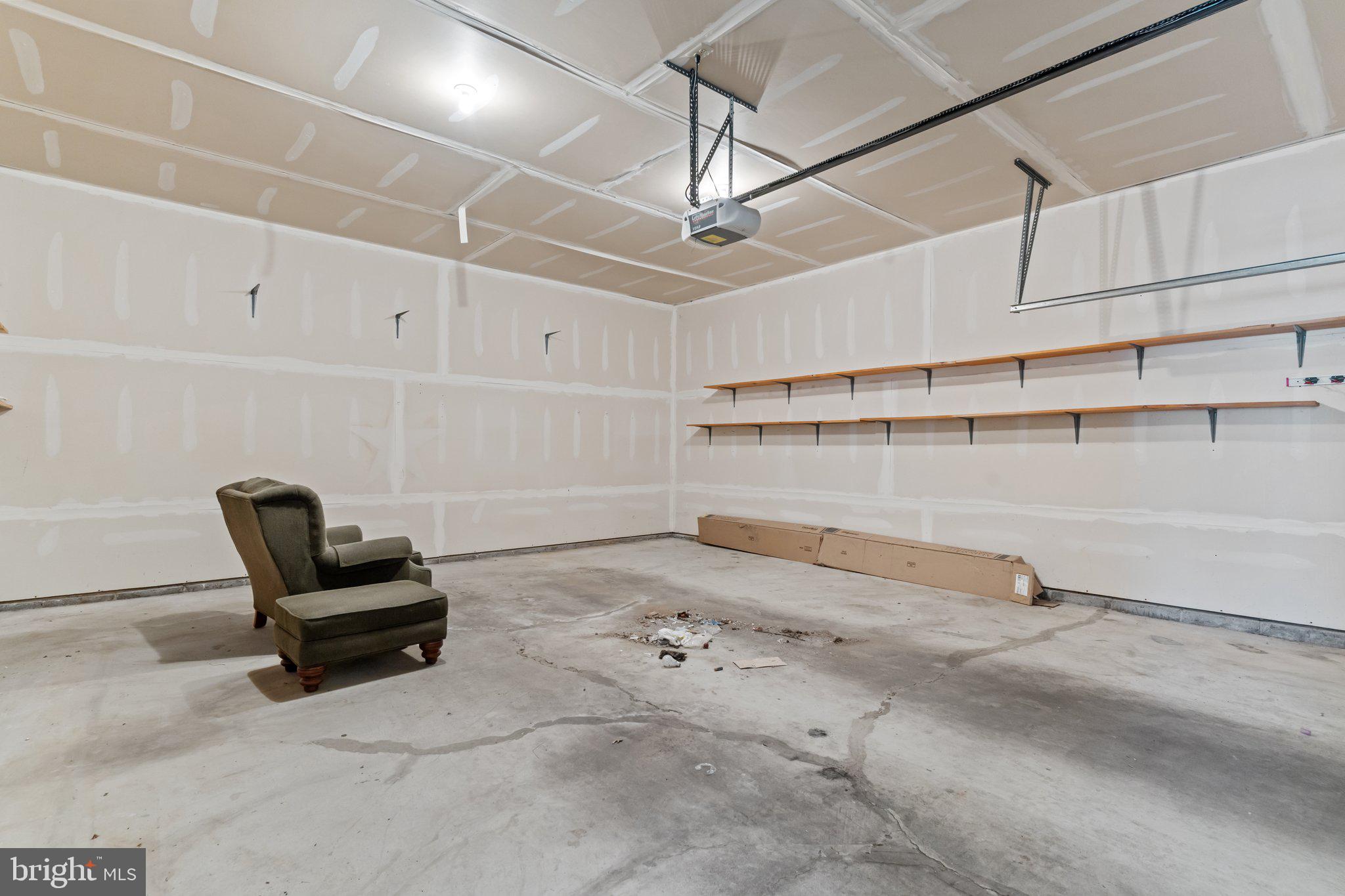 237 Beaumont Drive Oxford, PA 19363 - Photo 35 of 46 a living room with a couch and a stove
