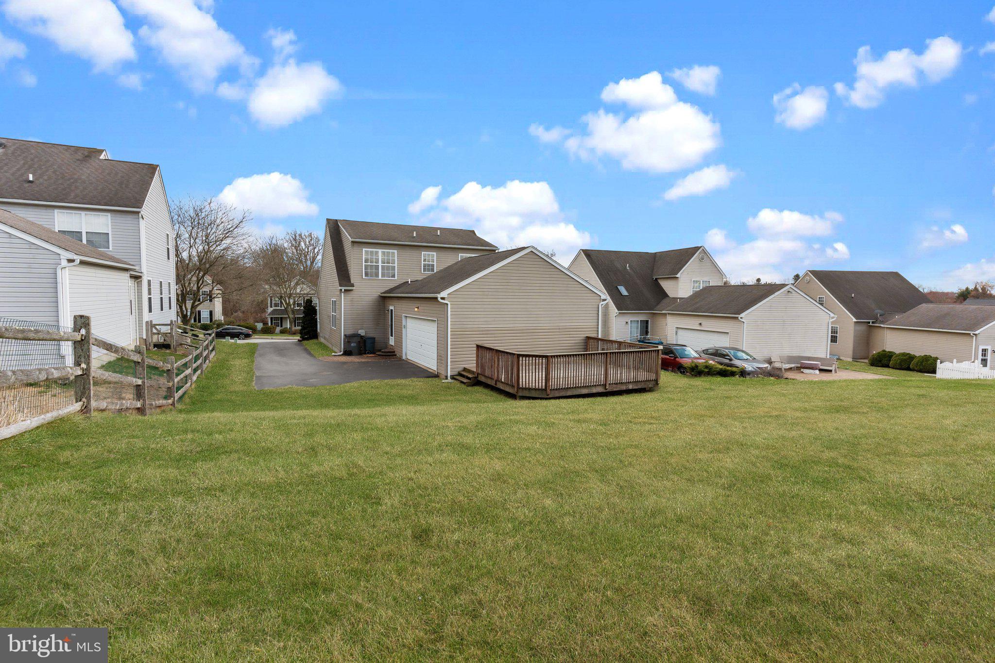237 Beaumont Drive Oxford, PA 19363 - Photo 36 of 46 a view of a house with a yard and garage