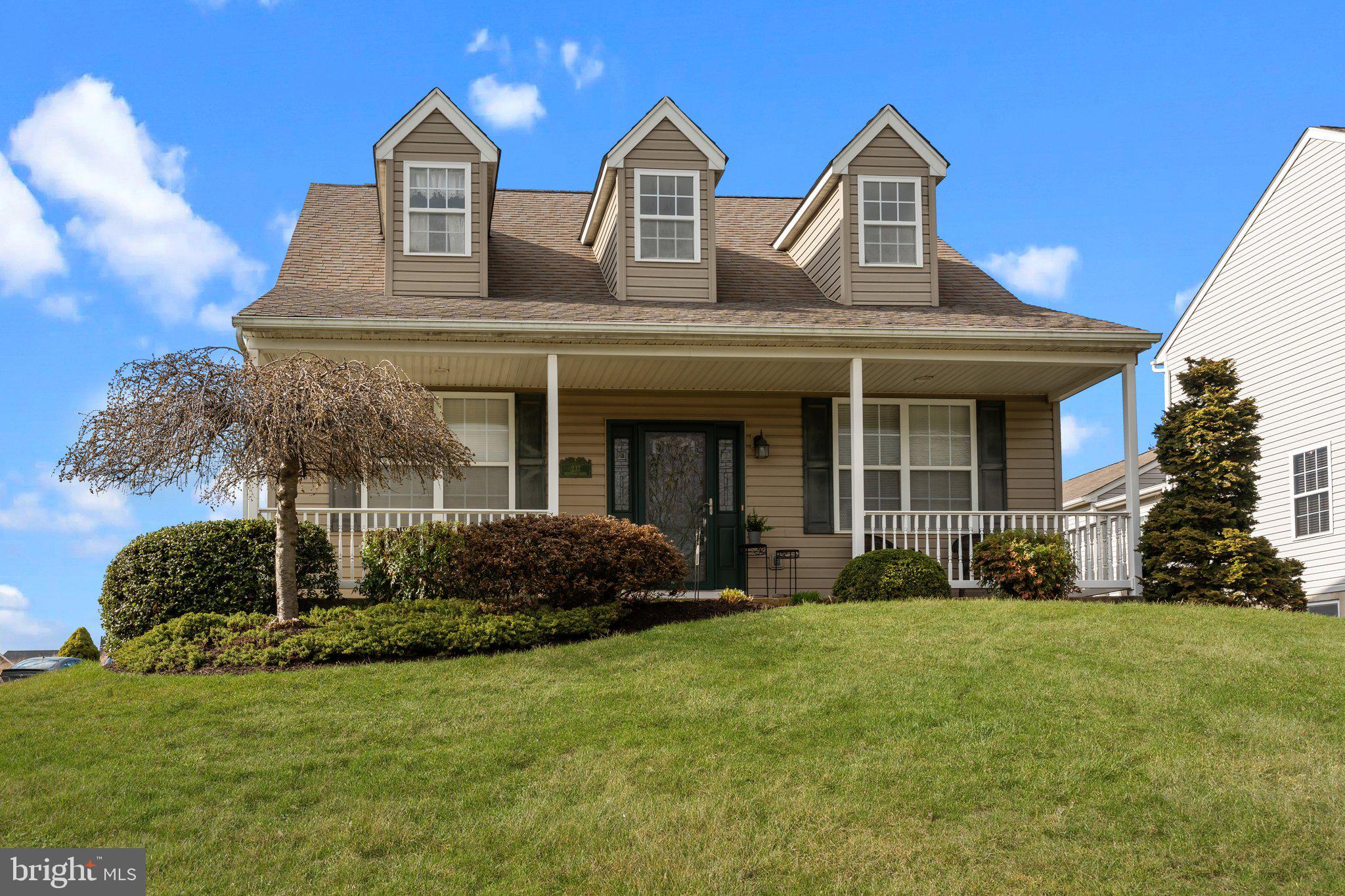 237 Beaumont Drive Oxford, PA 19363 - Photo 4 of 46 a front view of a house with a yard
