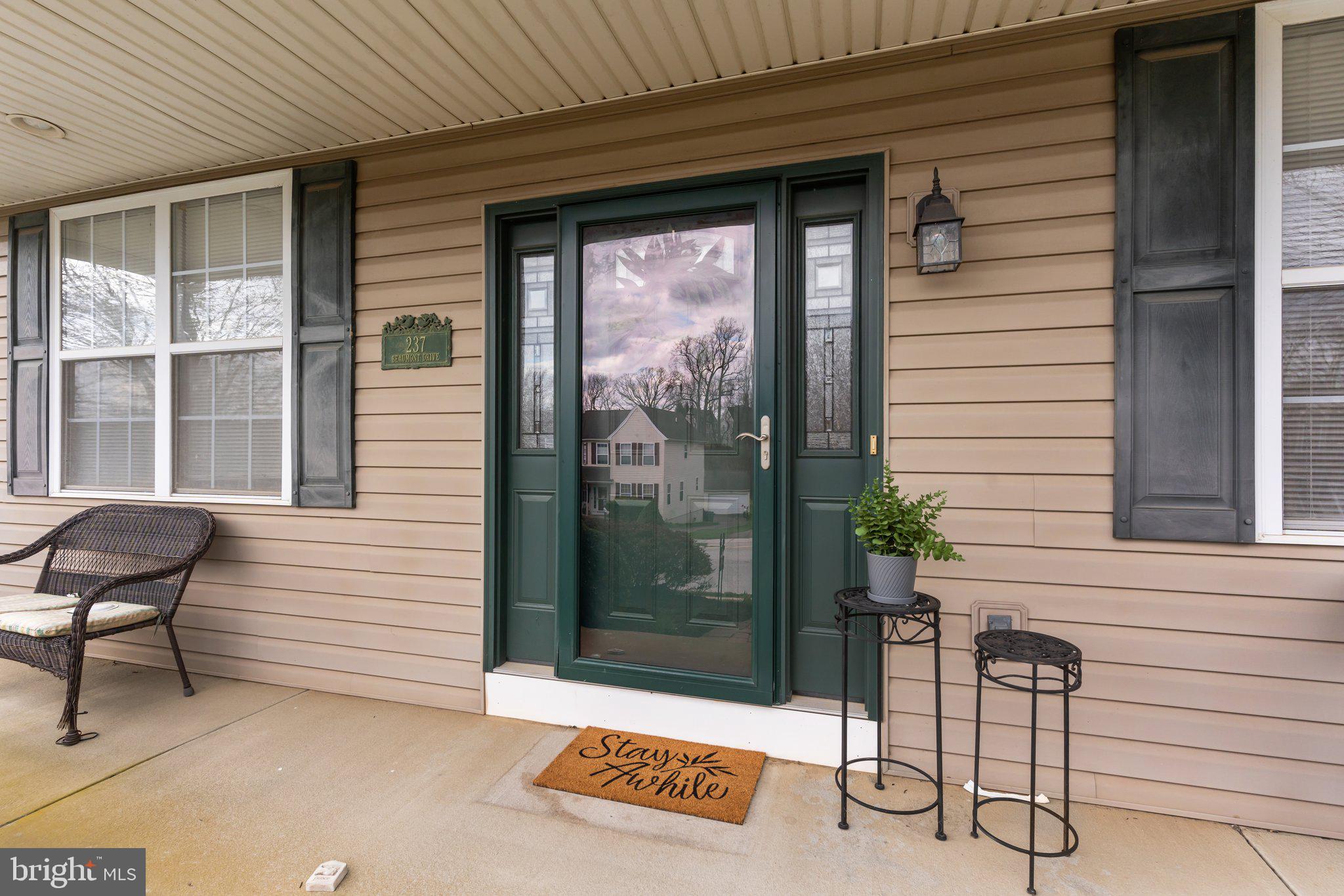 237 Beaumont Drive Oxford, PA 19363 - Photo 5 of 46 a view of a door and chair in front of house