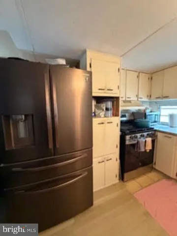 a utility room with closet dryer and washer