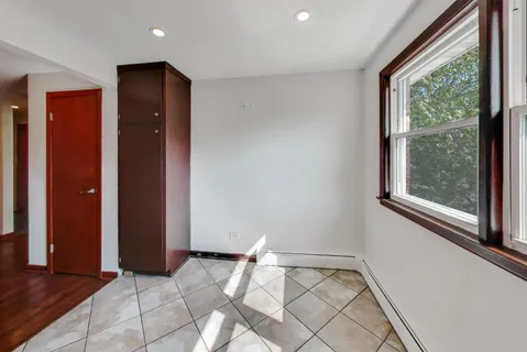 a view of an empty room and window