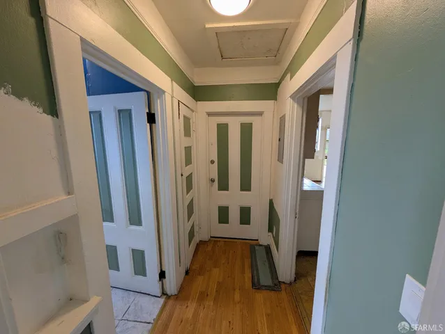a view of entryway with wooden floor