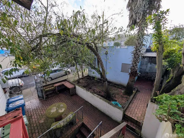 an outdoor sitting area with chairs