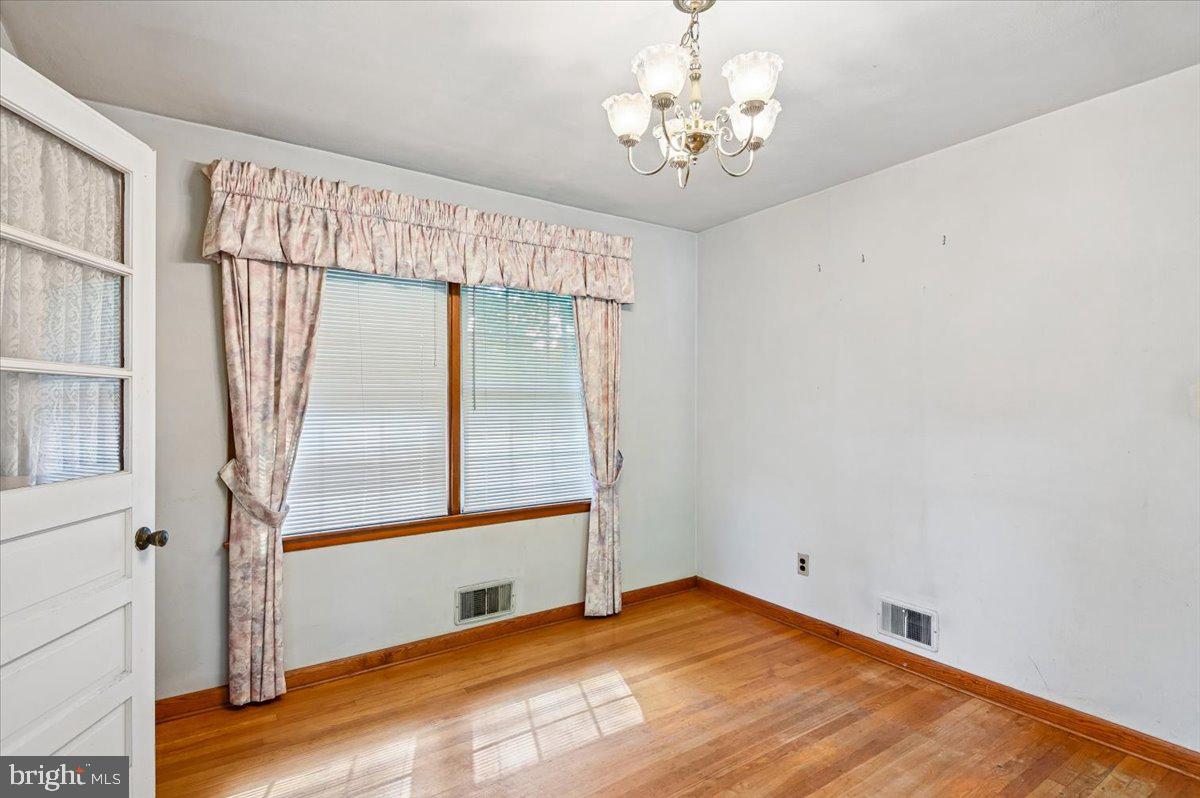 1509 Duvall Road Annapolis, MD 21409 - Photo 21 of 39 a view of an empty room with a window