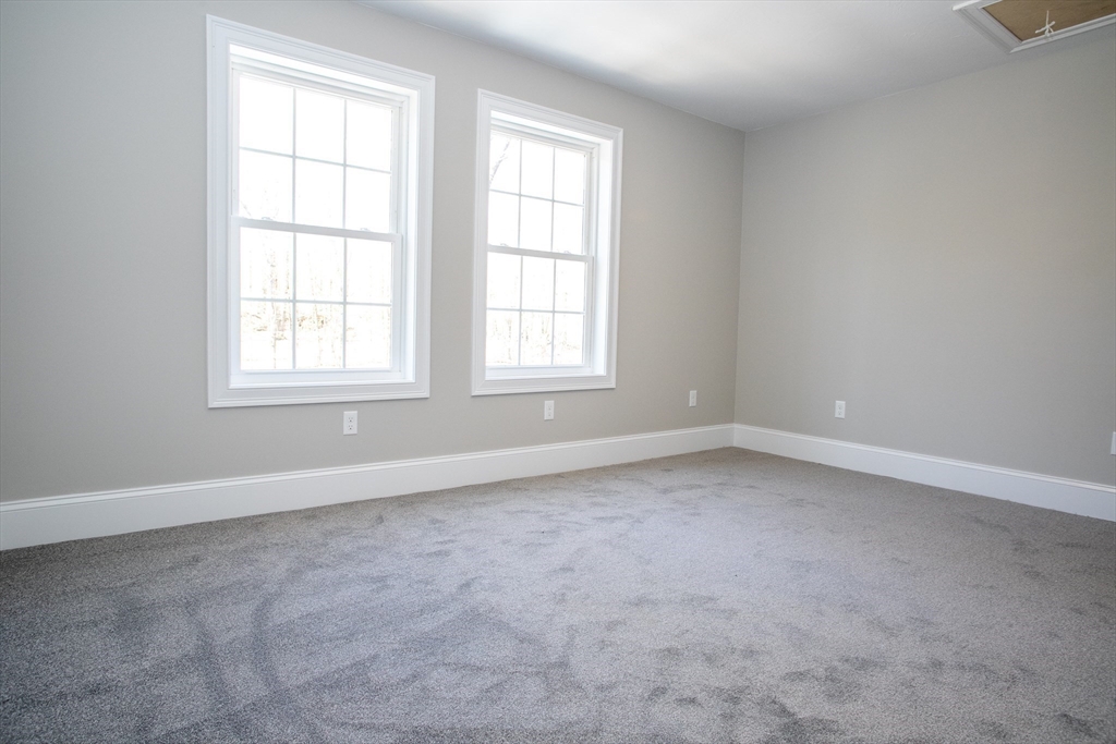 67 Willard Road Ashburnham, MA 01430 - Photo 31 of 42 an empty room with a window