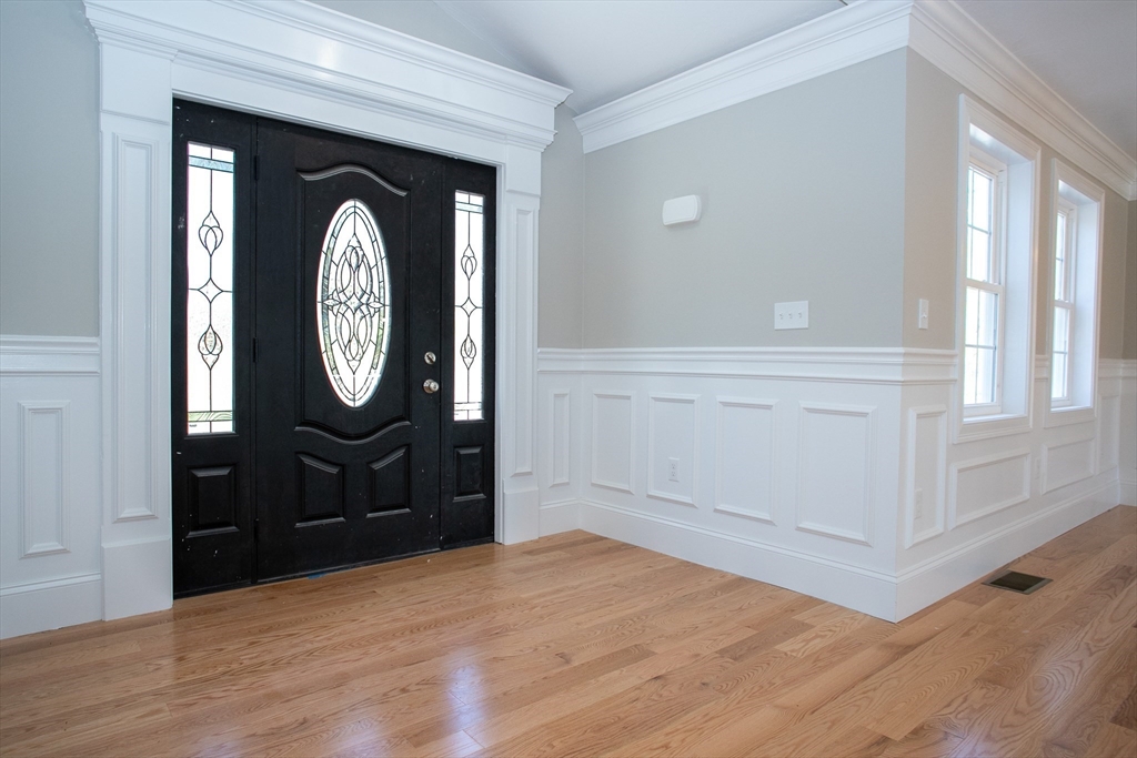 67 Willard Road Ashburnham, MA 01430 - Photo 6 of 42 a view of a hallway with wooden floor
