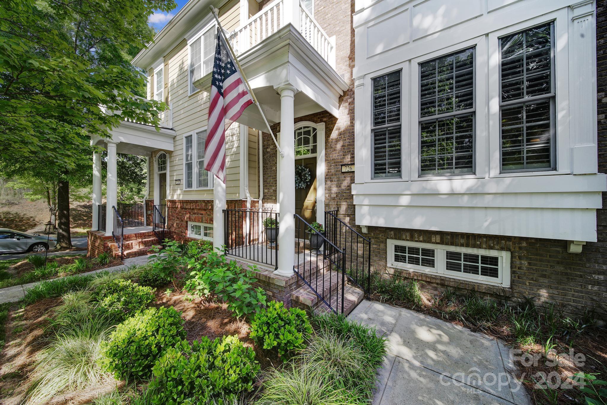 726 Passage Drive Fort Mill, SC 29708 - Photo 2 of 43 a front view of a house with a yard