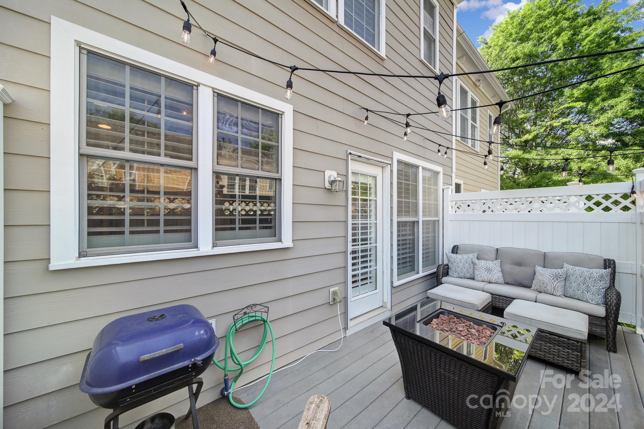 726 Passage Drive Fort Mill, SC 29708 - Photo 27 of 43 a outdoor living space with furniture and a potted plant