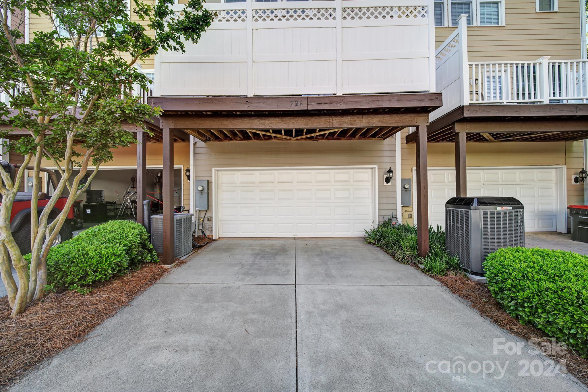 726 Passage Drive Fort Mill, SC 29708 - Photo 28 of 43 a front view of a house with garden