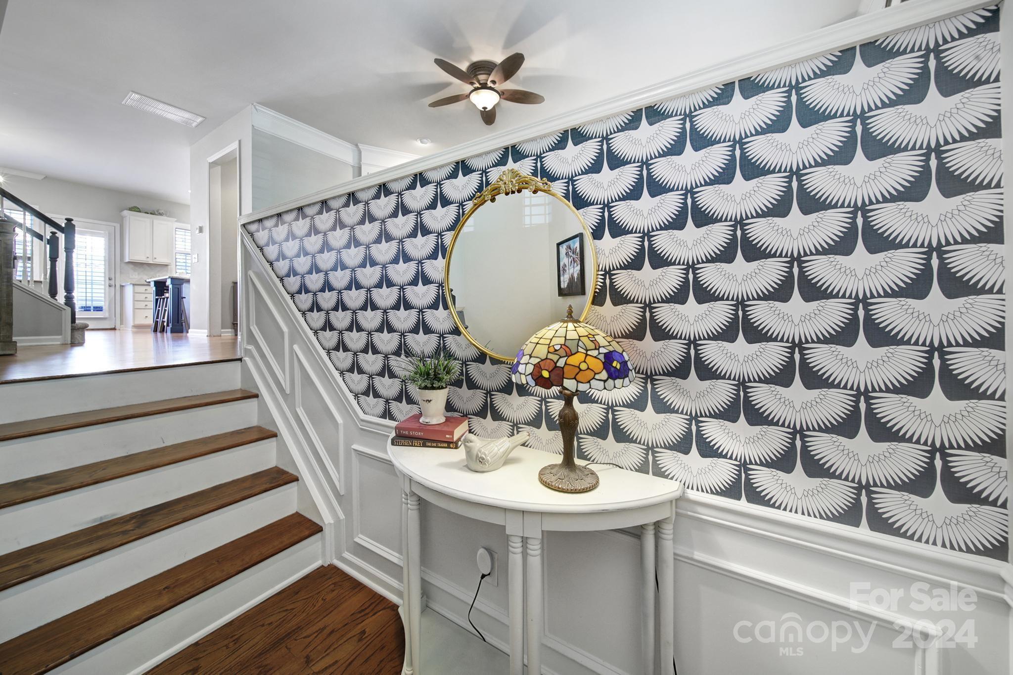 726 Passage Drive Fort Mill, SC 29708 - Photo 3 of 43 a view of a dining room with a sink and chandelier