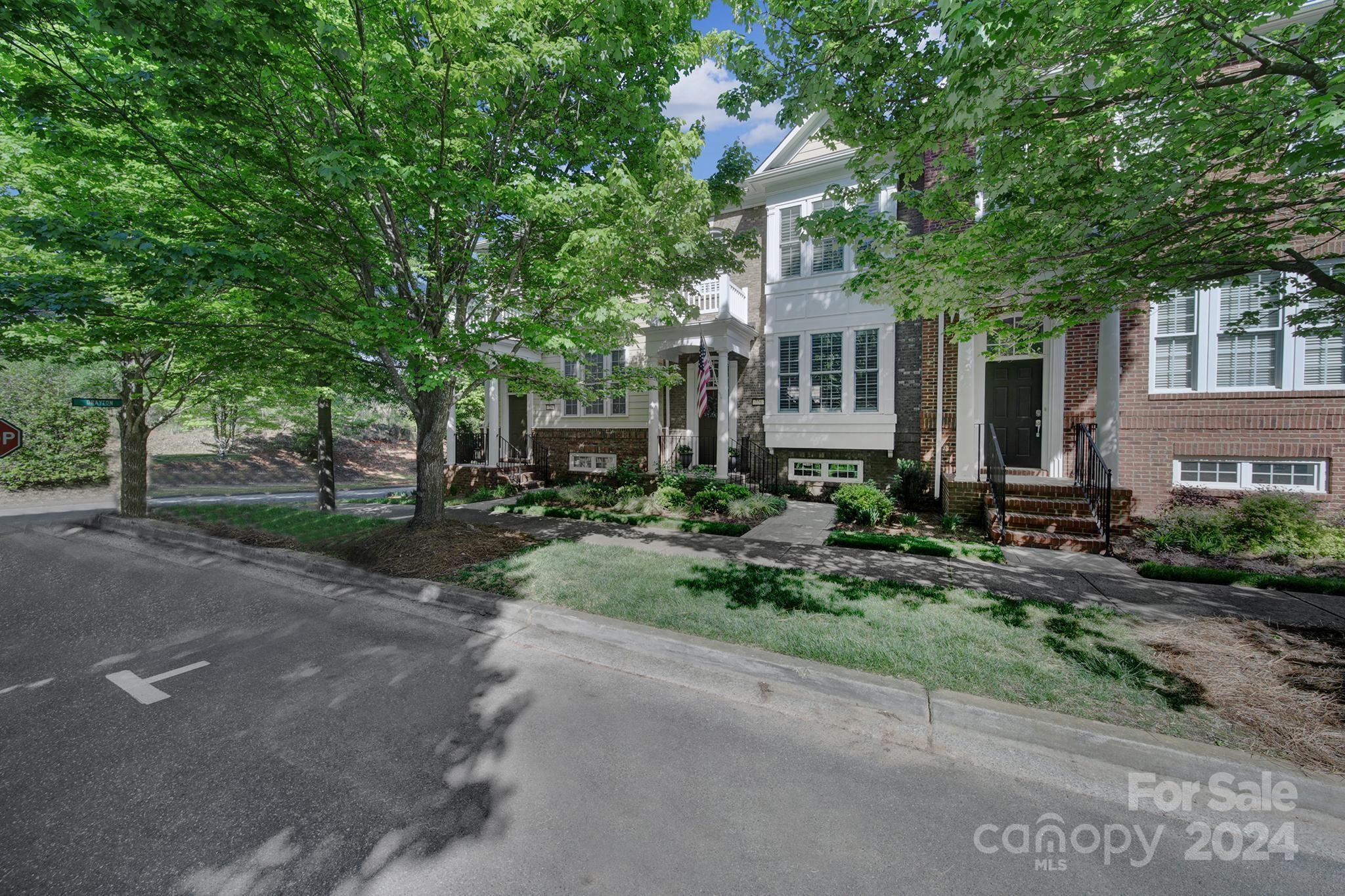 726 Passage Drive Fort Mill, SC 29708 - Photo 32 of 43 a front view of a house with garden