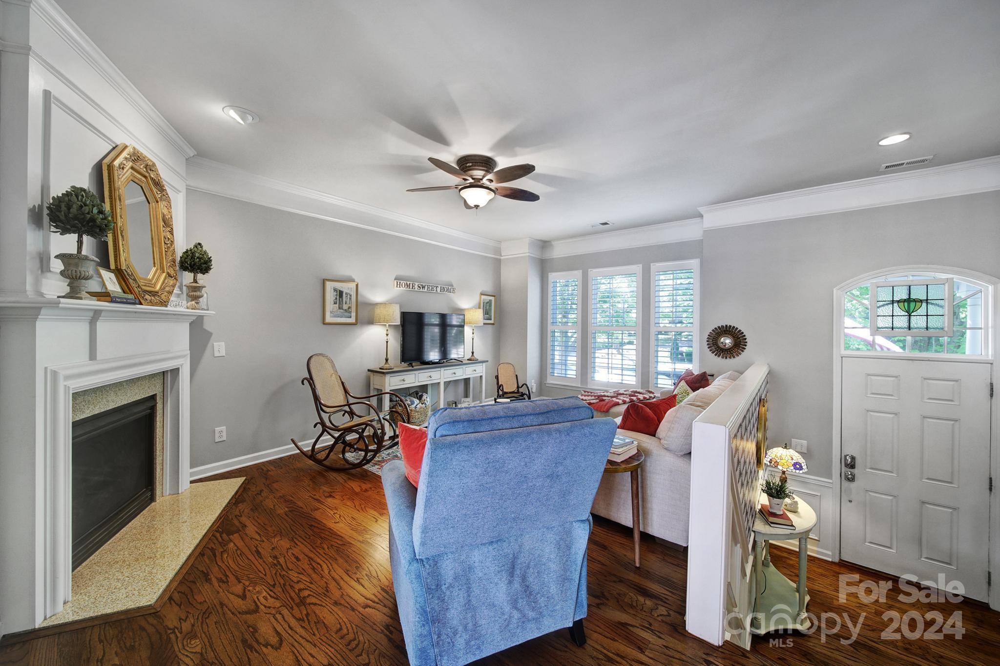 726 Passage Drive Fort Mill, SC 29708 - Photo 6 of 43 a living room with furniture and a fireplace