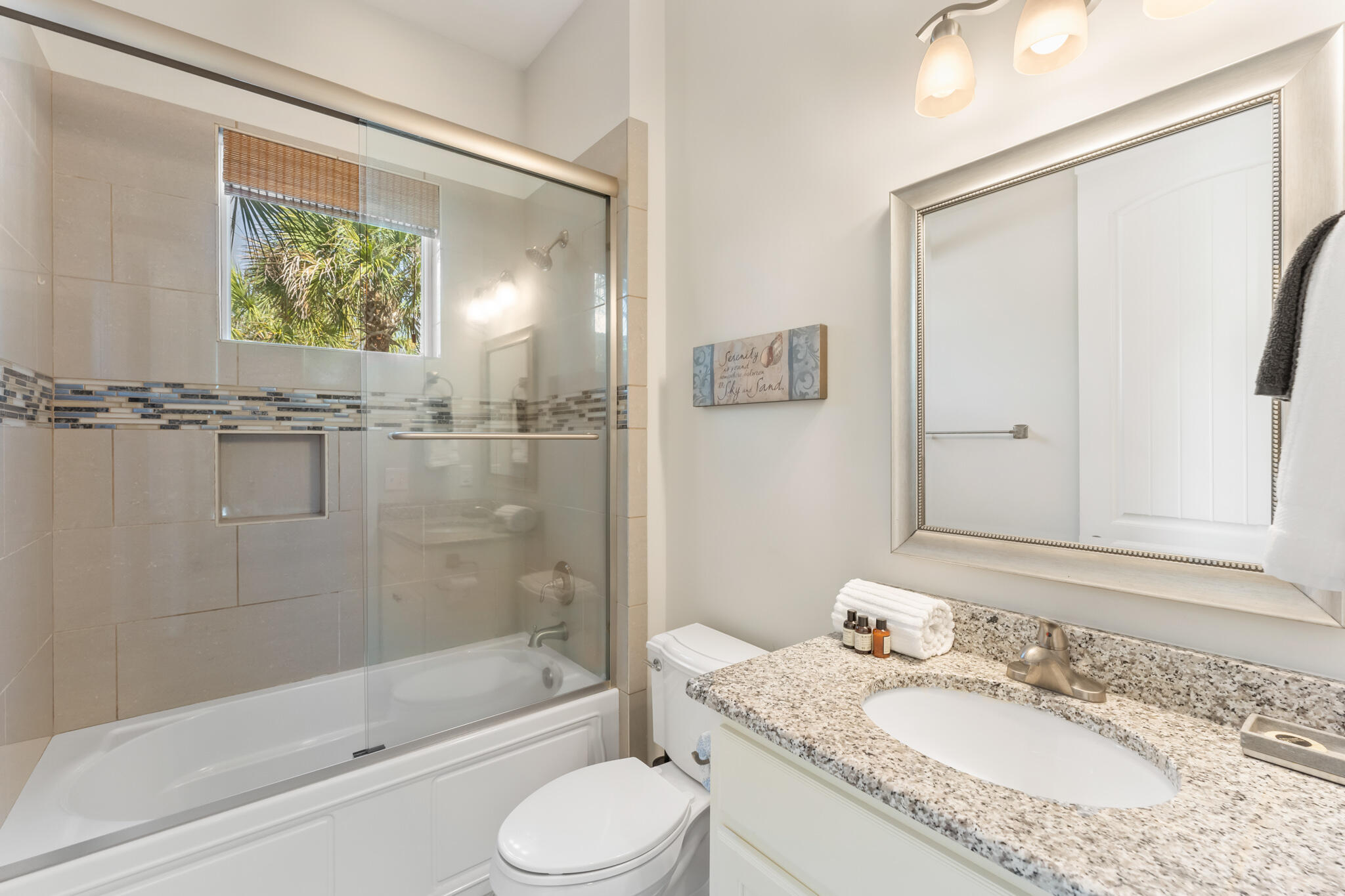 119 West Lifeguard Loop Inlet Beach Inlet Beach, FL 32461 - Photo 19 of 75 a bathroom with a granite countertop sink a mirror a bathtub and shower