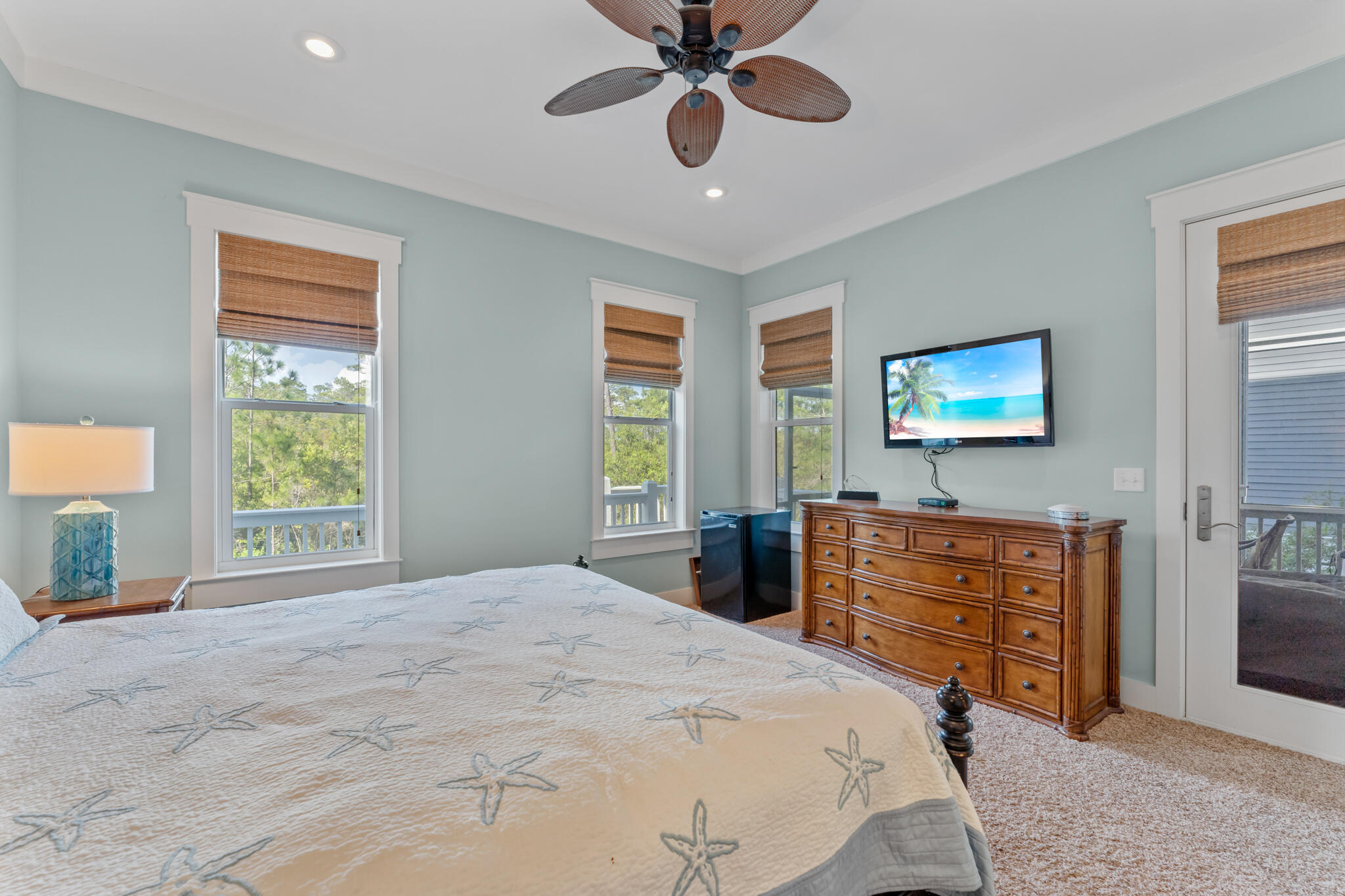 119 West Lifeguard Loop Inlet Beach Inlet Beach, FL 32461 - Photo 24 of 75 a bedroom with a bed and a chandelier