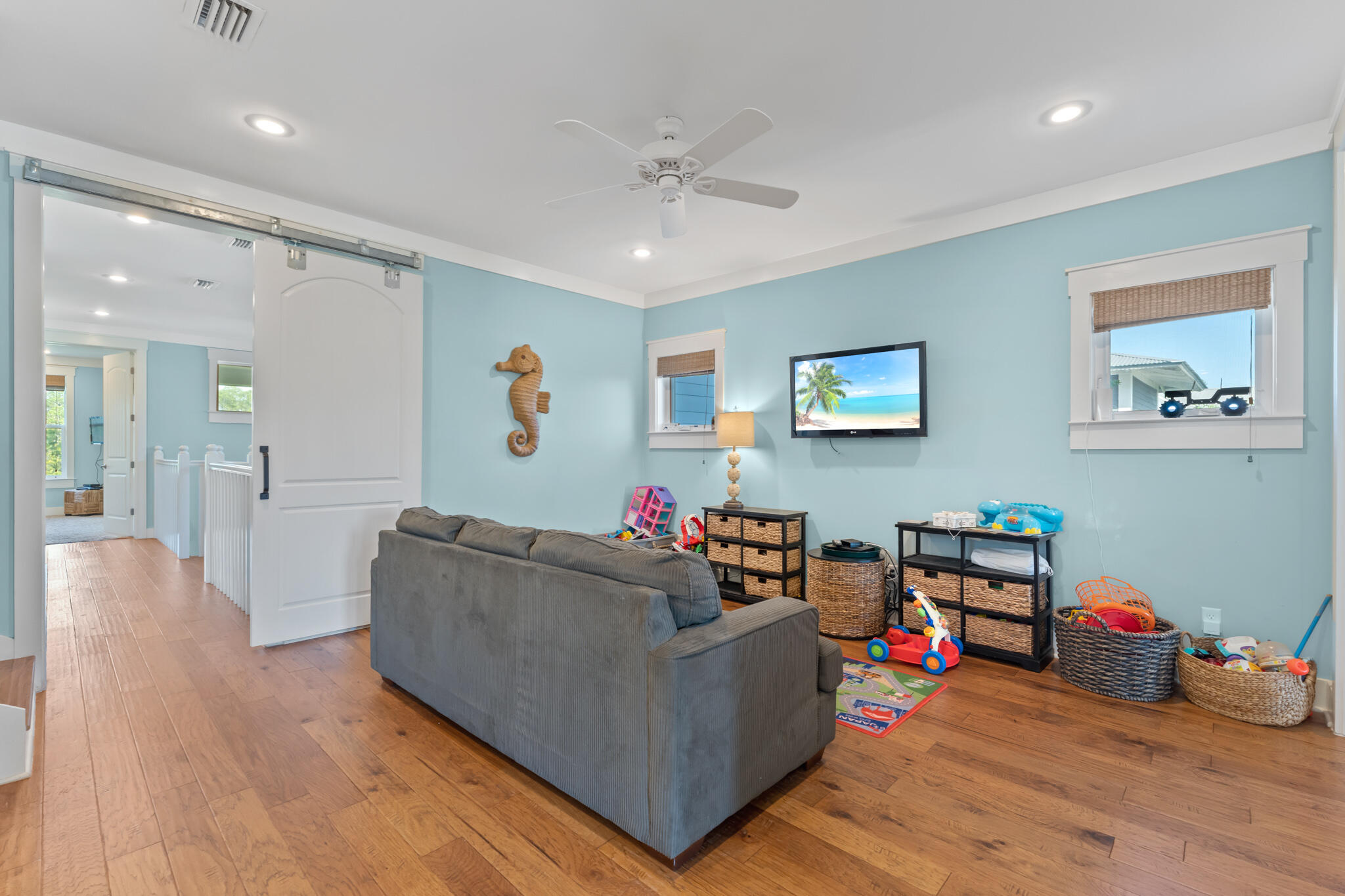 119 West Lifeguard Loop Inlet Beach Inlet Beach, FL 32461 - Photo 26 of 75 a living room with furniture and a wooden floor
